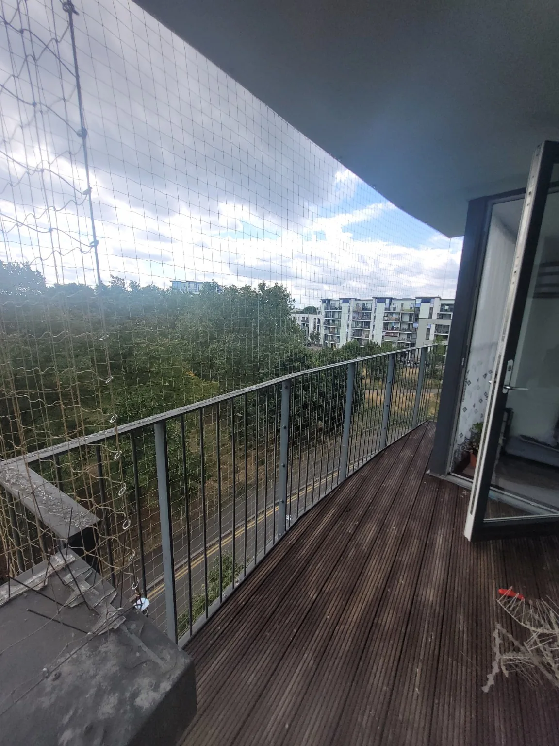 Balcony netting fitted around the usable space