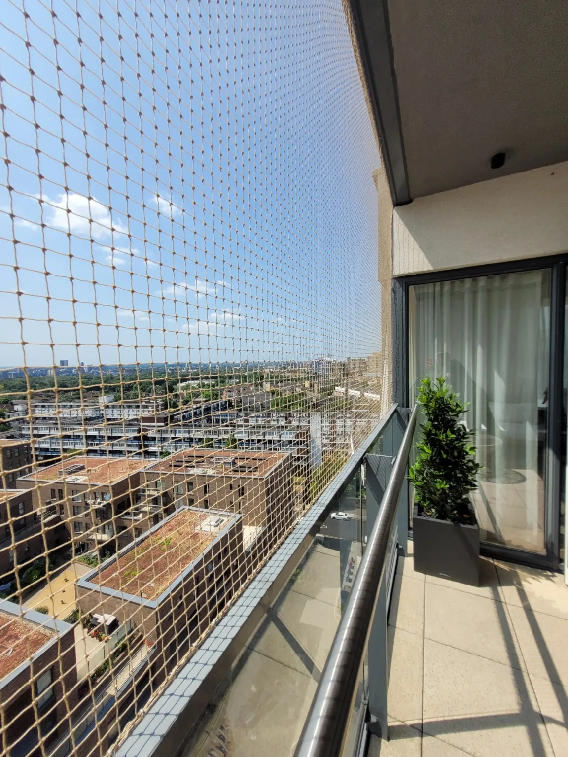 High-level balcony netting installation