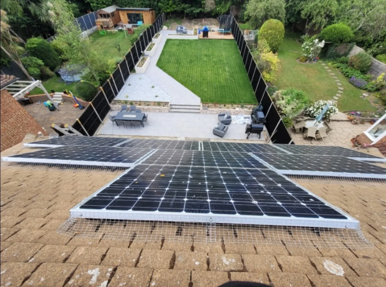 Solar array protected with perimeter mesh